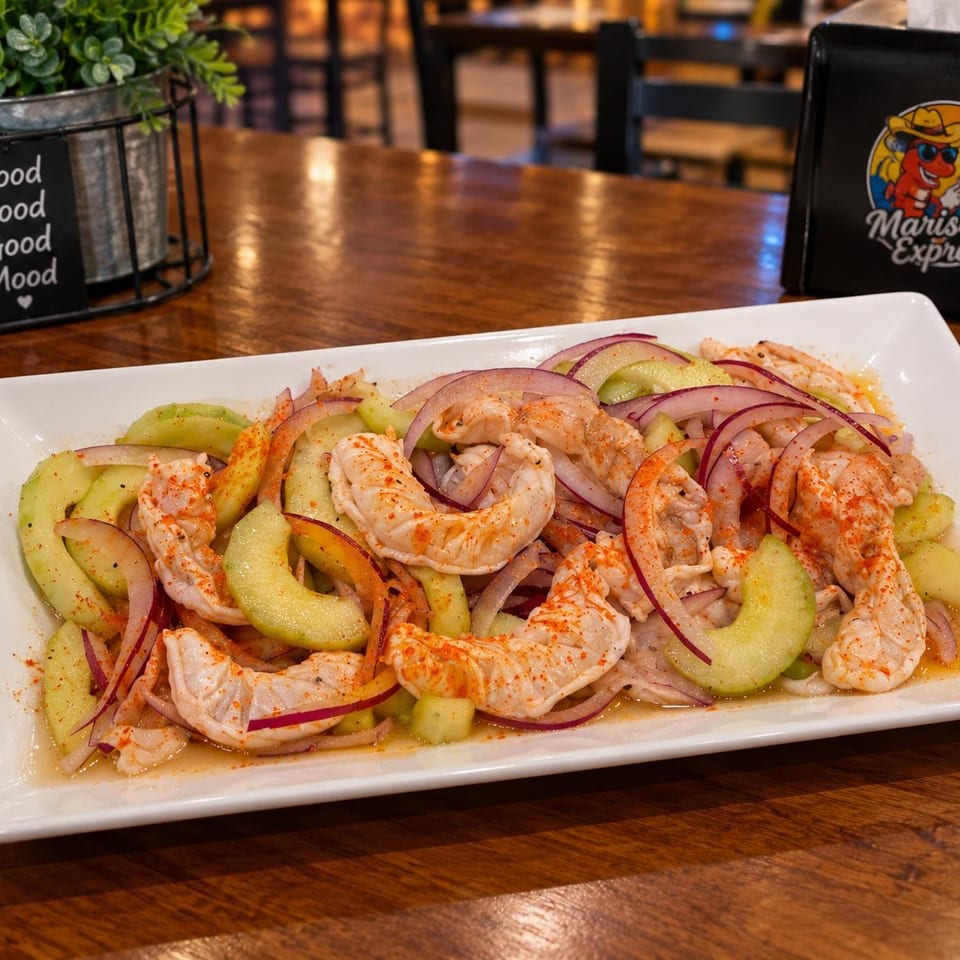 Seasoned shrimp with cucumber and red onion